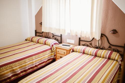 Foto de una habitación de Hostal la Campana