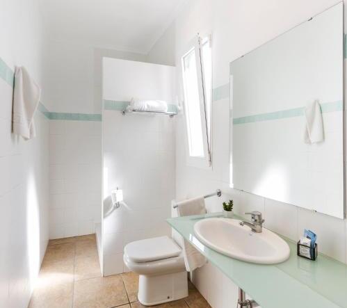 Foto de una habitación de Hostal Tres Molins