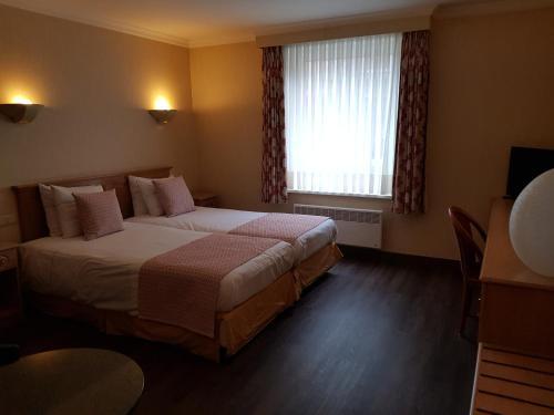 Foto de una habitación de Hotel Beach Palace