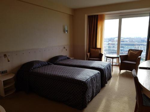 Foto de una habitación de Hotel Beach Palace