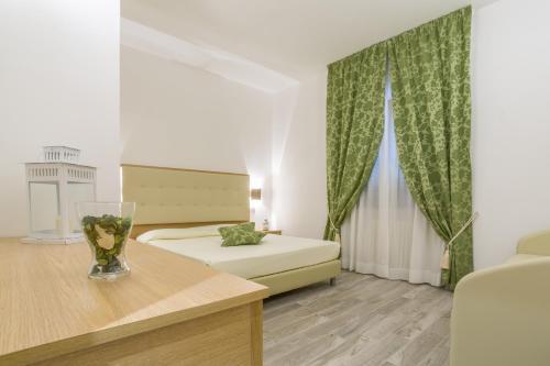 Foto de una habitación de Hotel Il Buongustaio