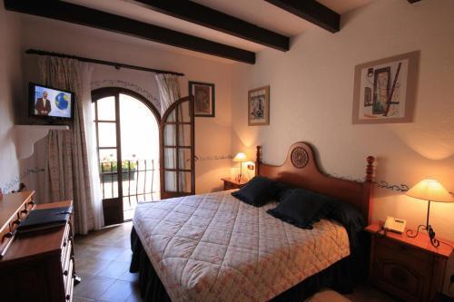 Foto de una habitación de Petit Hotel Ses Rotges