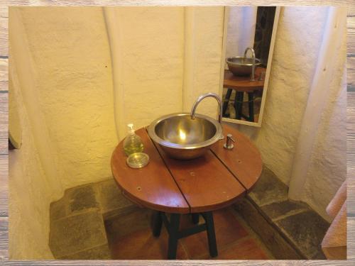 Foto del baño de Las Cabañas de Tarii