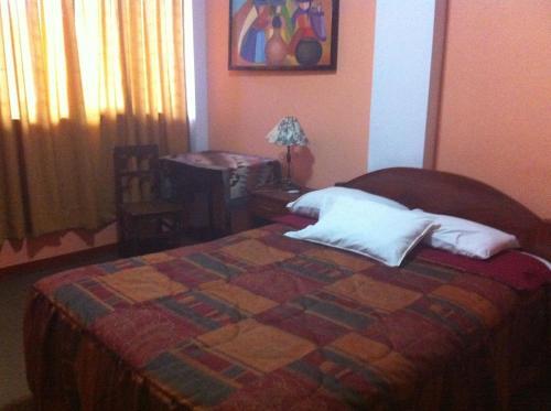 Foto de una habitación de Hostal Tres Máscaras