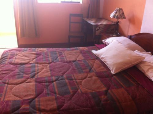 Foto de una habitación de Hostal Tres Máscaras