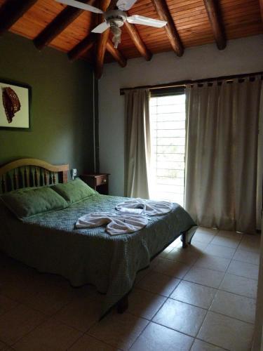 Foto de una habitación de Yerba Buena casas de campo - Arroyo de los Patos