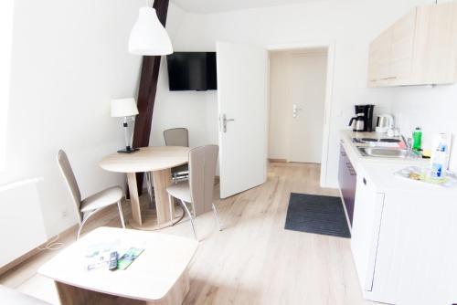 Foto de una habitación de Apartments am Schlosspark