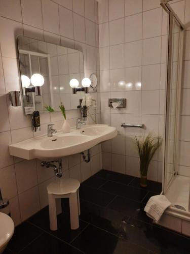 Foto de una habitación de AVALON Hotelpark Königshof