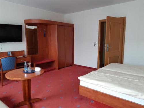 Foto de una habitación de AVALON Hotelpark Königshof