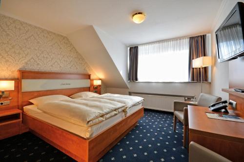 Foto de una habitación de Landgasthaus &amp;amp; Hotel Lindenhof
