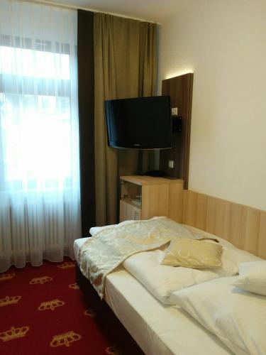 Foto de una habitación de Hotel Krone