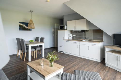 Foto de una habitación de Strandhafer Aparthotel