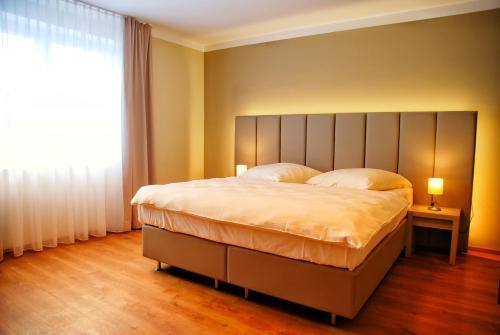 Foto de una habitación de Walldorf Suites Boutique Hotel