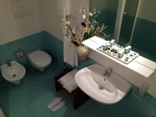 Foto de una habitación de Golf Hotel La Pinetina