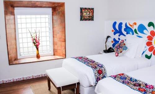 Foto de una habitación de Hotel El Retablo