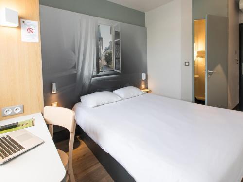 Foto de una habitación de B&amp;amp;B Hôtel Rennes Est Cesson Sévigné