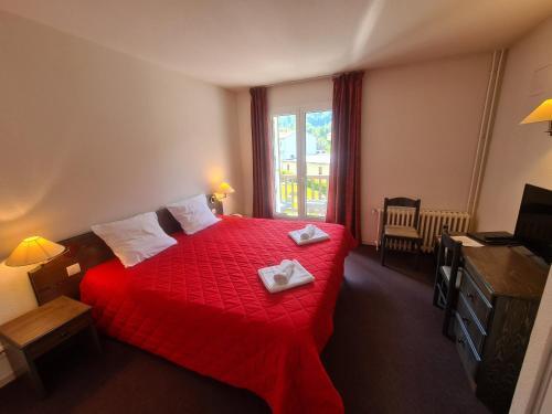 Foto de una habitación de Hôtel Le Montaigu