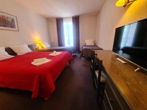 Foto de una habitación de Hôtel Le Montaigu
