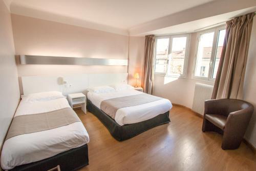 Foto de una habitación de Hôtel Mondial