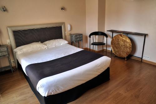 Foto de una habitación de Hôtel Mondial