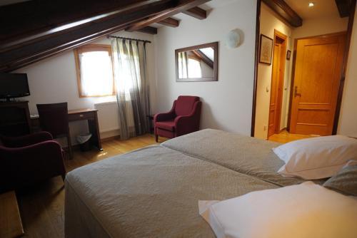 Foto de una habitación de Hotel Abetos
