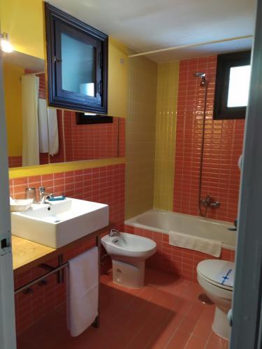 Foto de una habitación de Apartamentos La Iguana