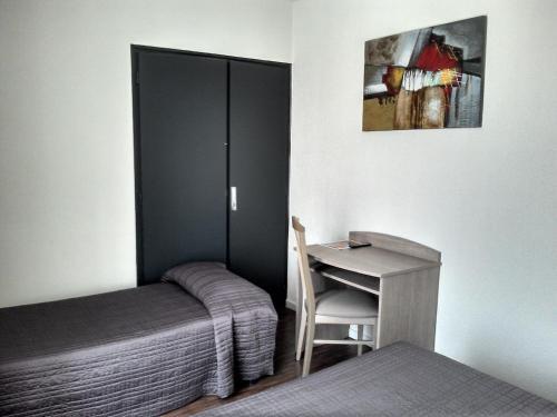Foto de una habitación de Acqs Hôtel