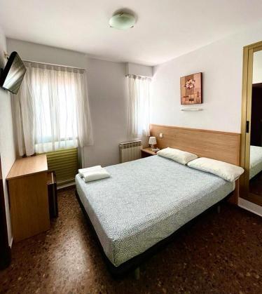 Foto de una habitación de Hostal Milmarcos