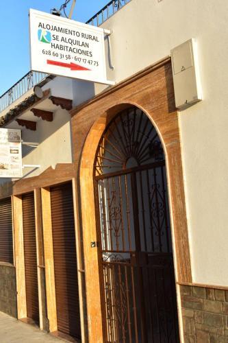 Foto de una habitación de Iznájar Suites