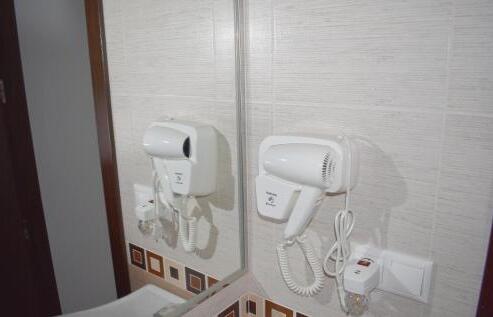 Foto de una habitación de Iznájar Suites