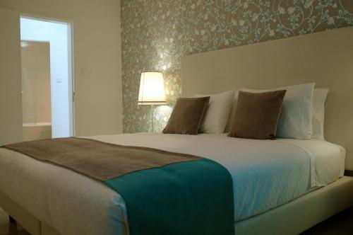 Foto de una habitación de Hotel Dom Lourenco