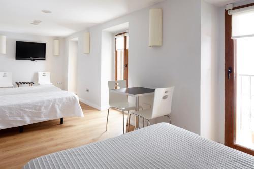 Foto de una habitación de Hotel Olatu