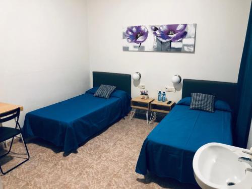 Foto de una habitación de Hostal Carlos III