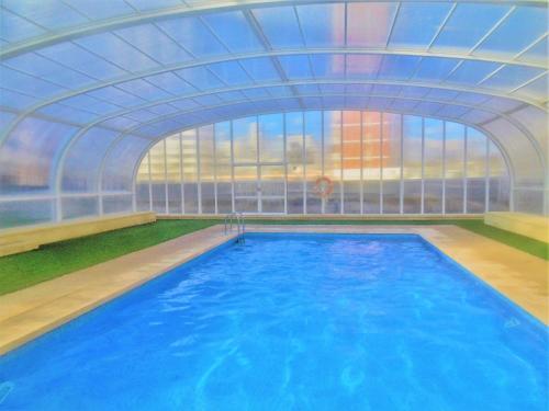Foto de una habitación de Alquileres Vacacionales Gemelos 26-T2-27-C