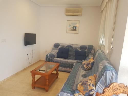 Foto de una habitación de Alquileres Vacacionales Urbanización Torremar Natura vacacionesenvera.com