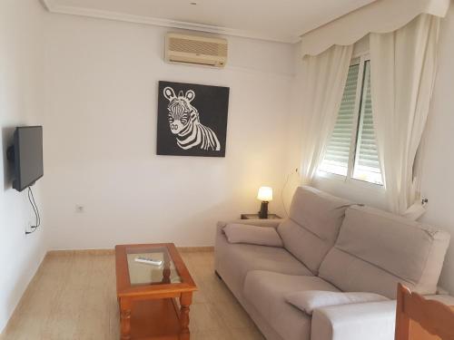 Foto de una habitación de Alquileres Vacacionales Urbanización Torremar Natura vacacionesenvera.com