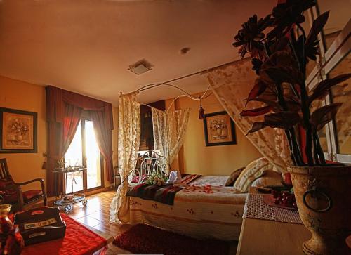 Foto de una habitación de Laurel de la Reina Bed &amp;amp; Breakfast - Boutique