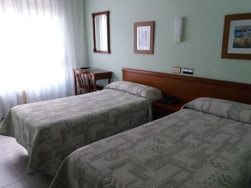 Foto de una habitación de Hotel Avenida