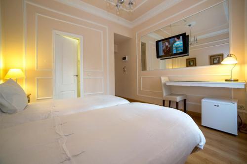 Foto de una habitación de Hostal Adria Santa Ana