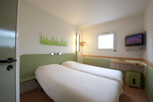 Foto de una habitación de Hotel ibis budget Pau Lescar