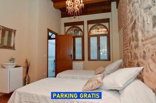Foto de una habitación de Apartamentos La Casa Del Grial