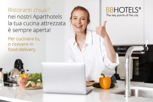 Foto de una habitación de BB Hotels Aparthotel Arcimboldi