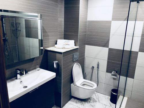 Foto de una habitación de The Streamliner Hotel Apartment