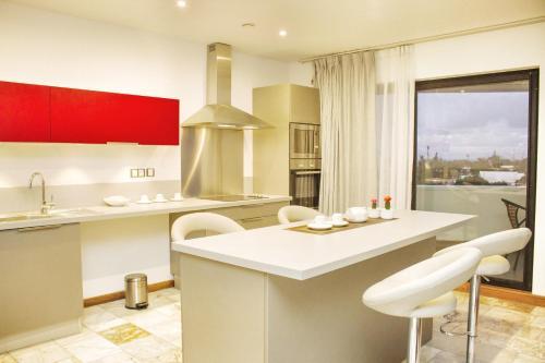 Foto de una habitación de The Streamliner Hotel Apartment