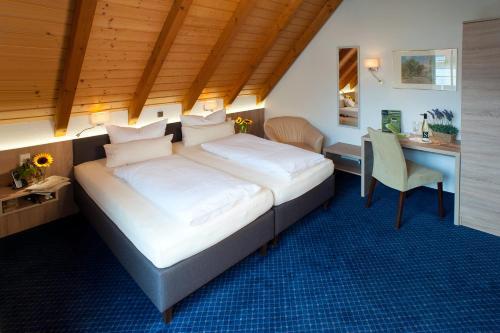 Foto de una habitación de Stadthotel Pfeffermühle
