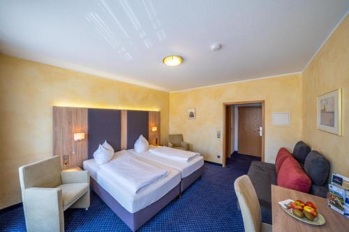 Foto de una habitación de Stadthotel Pfeffermühle