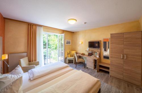 Foto de una habitación de Stadthotel Pfeffermühle