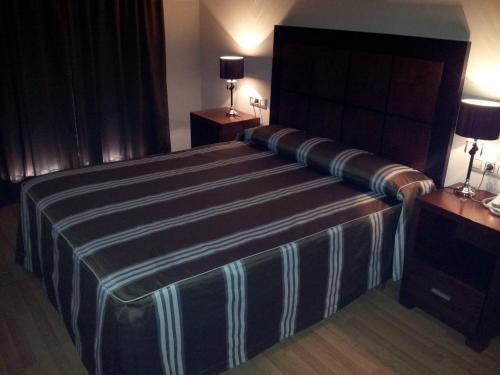 Foto de una habitación de Hotel AV Apartamentos Lobios