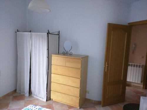 Foto de una habitación de Apartamentos San Roque 18
