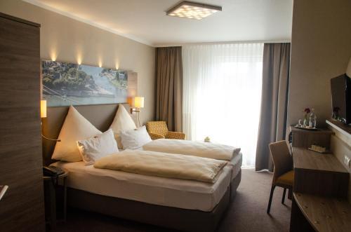 Foto de una habitación de Hotel Haus Morjan